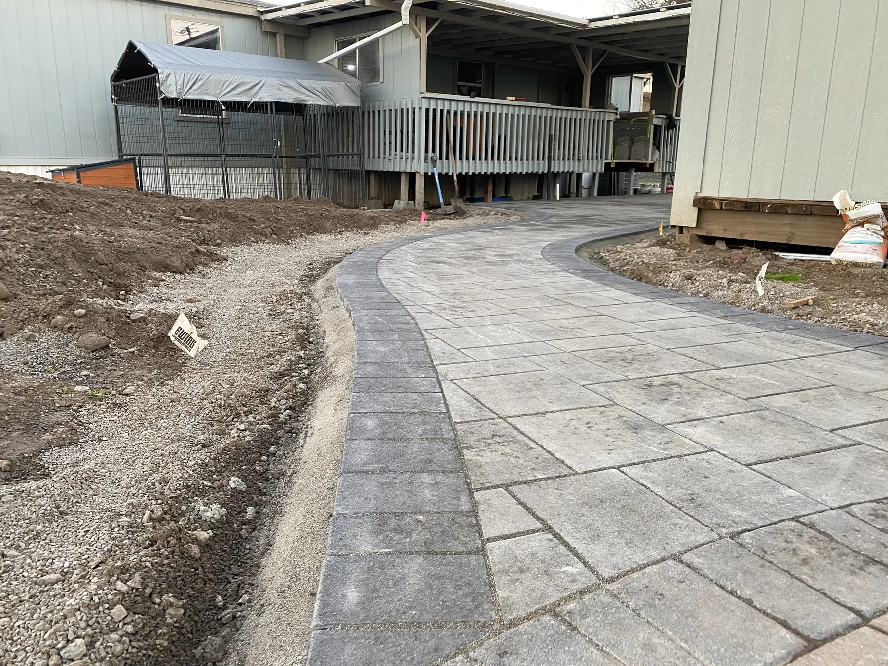 Curved paver walkway completed by Element Curved paver walkway completed by Element