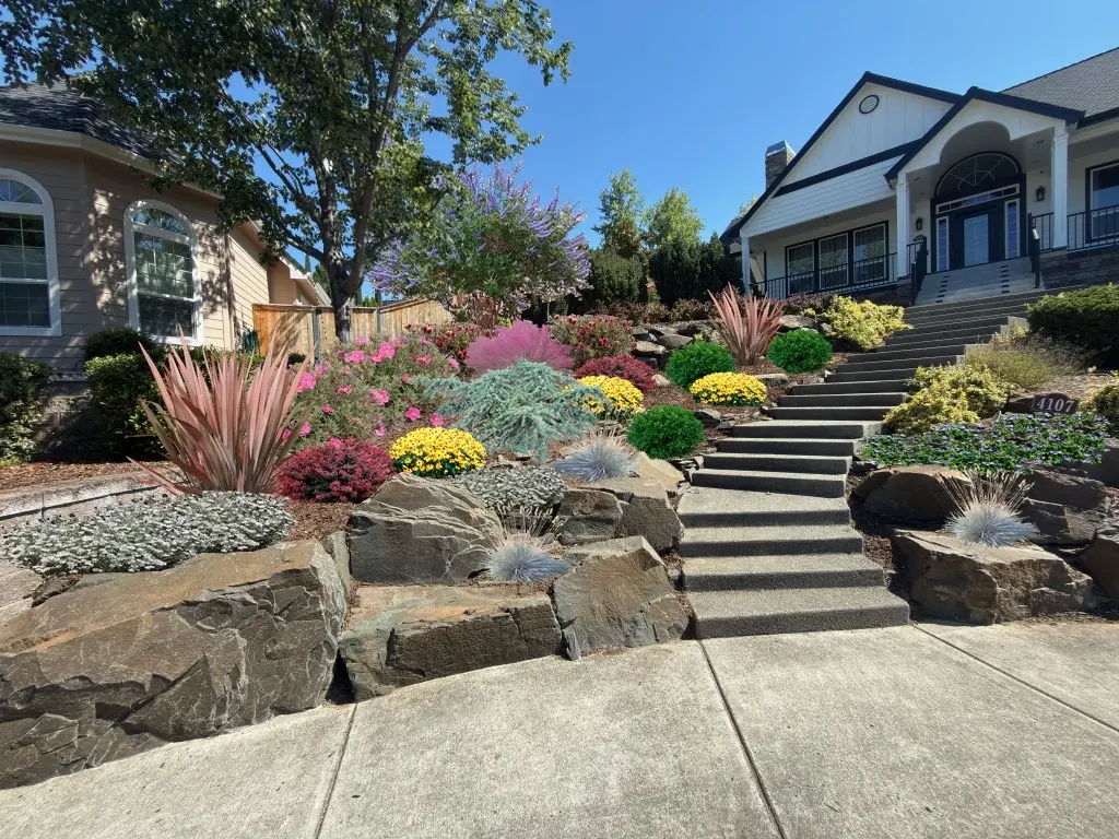 Layered front landscape with stone steps completed by Element Layered front landscape with stone steps completed by Element