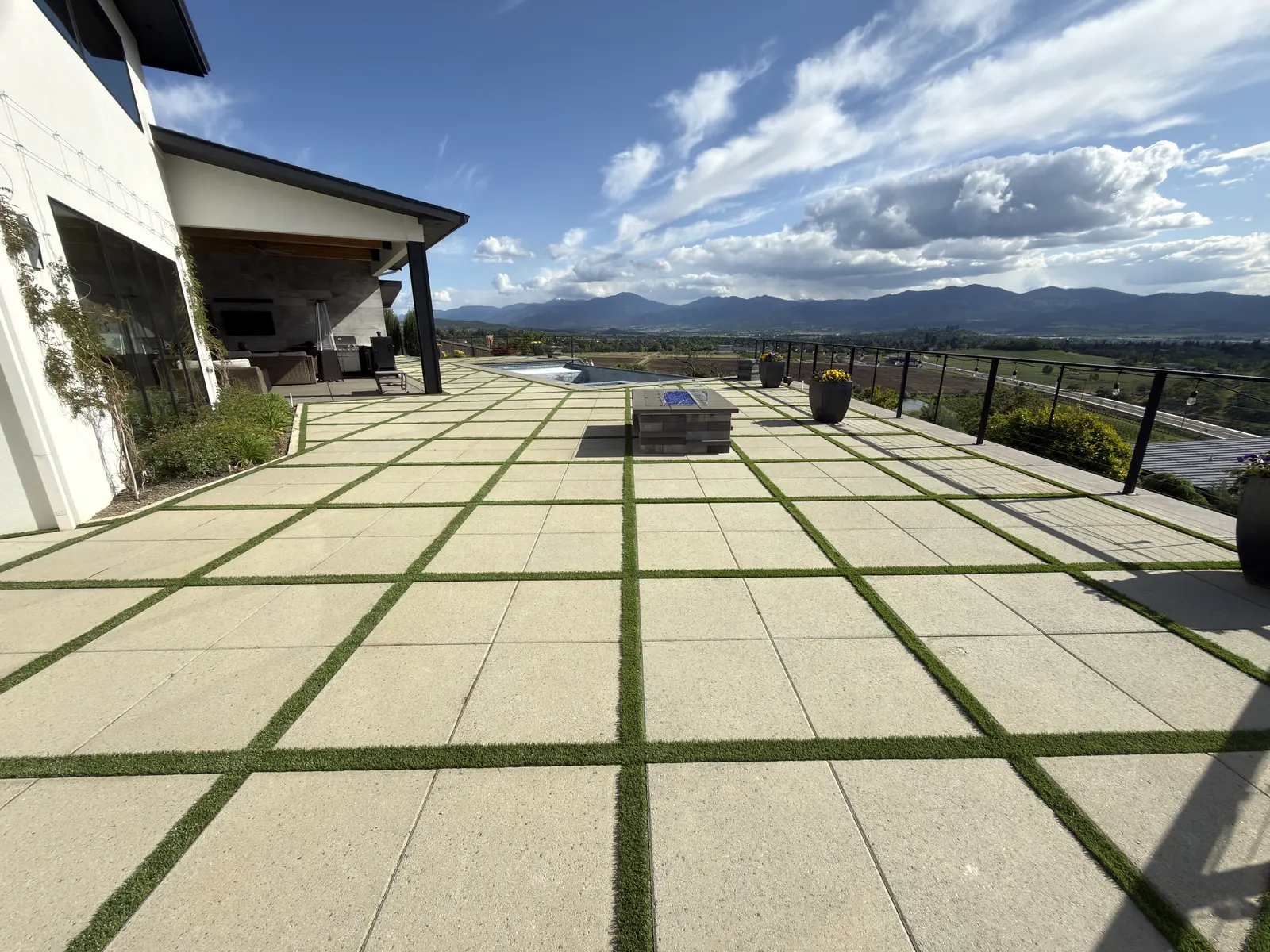 Paver and turf outdoor-living patio